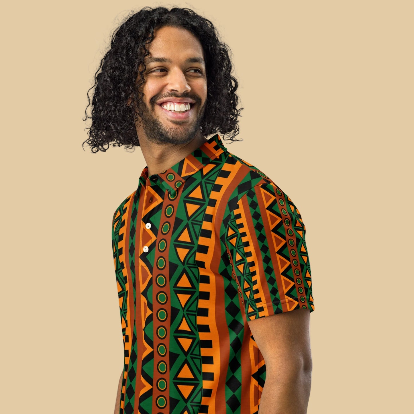 Man smiling in a geometric shirt